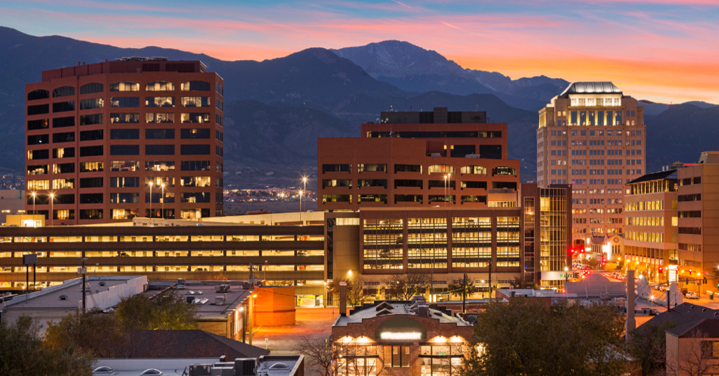 downtown Colorado Springs office buildings at sunset